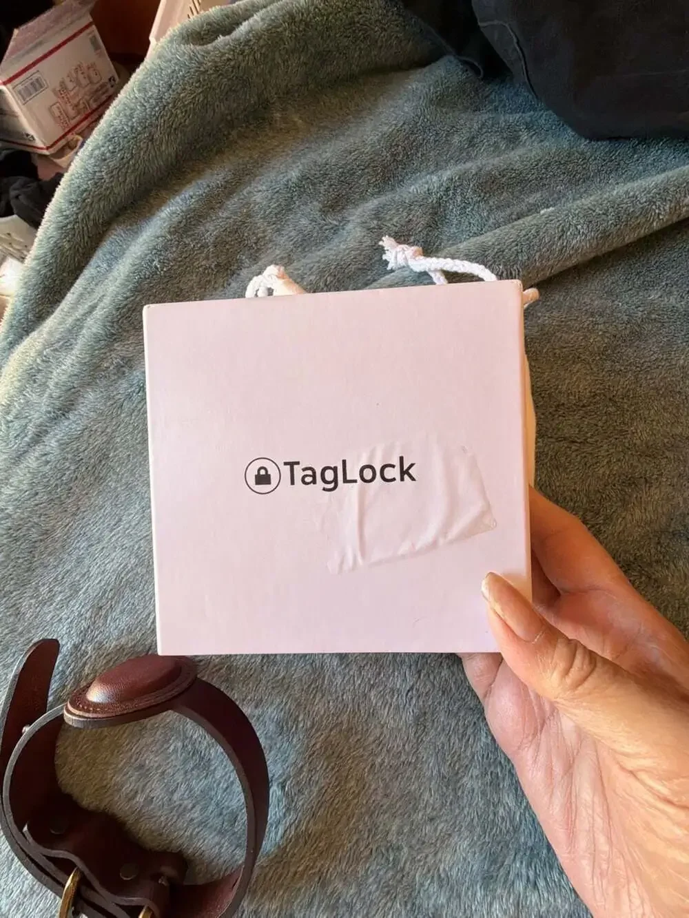 TagLock Leather AirTag Collar Holder Brown with a TrackR bravo device